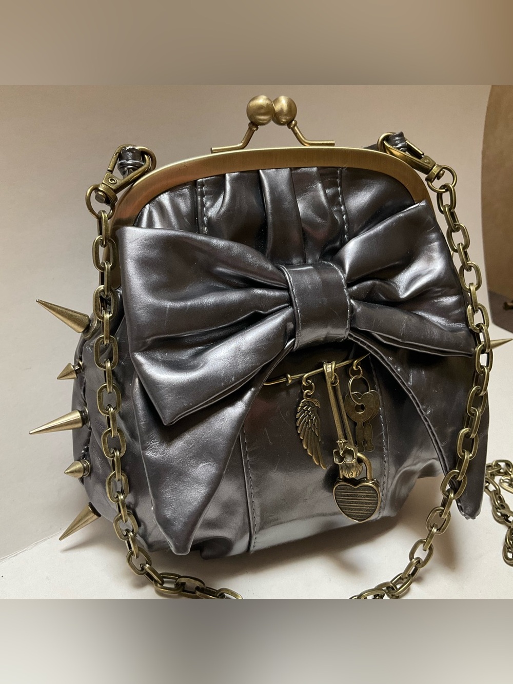 SPIKE STUD Metallic Gunmetal Bow Chain Crossbody Bag Antique Gold Brass Kisslock